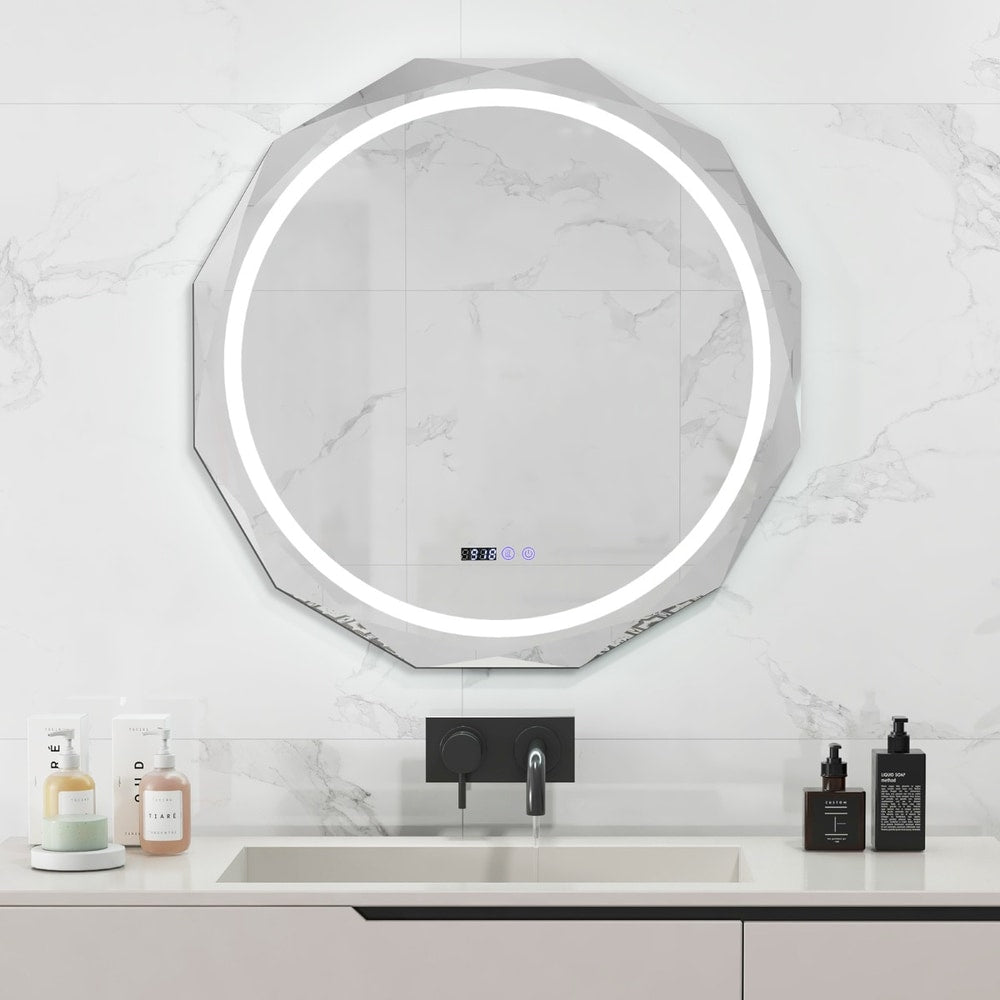 The circular bathroom mirror with a glowing light ring mounted on a white marble wall