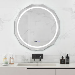 The circular bathroom mirror with a glowing light ring mounted on a white marble wall