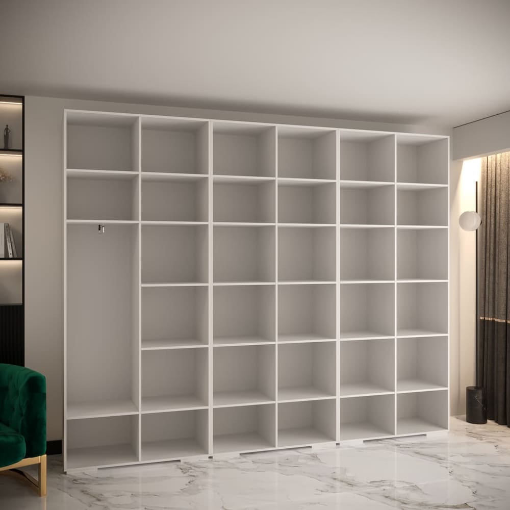 The open hinged wardrobe showing a large shelving unit