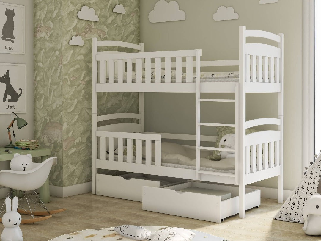 The bunk bed in white shown from the left side with a drawer open in a decorated room