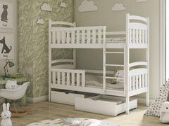 The bunk bed in white shown from the left side with a drawer open in a decorated room