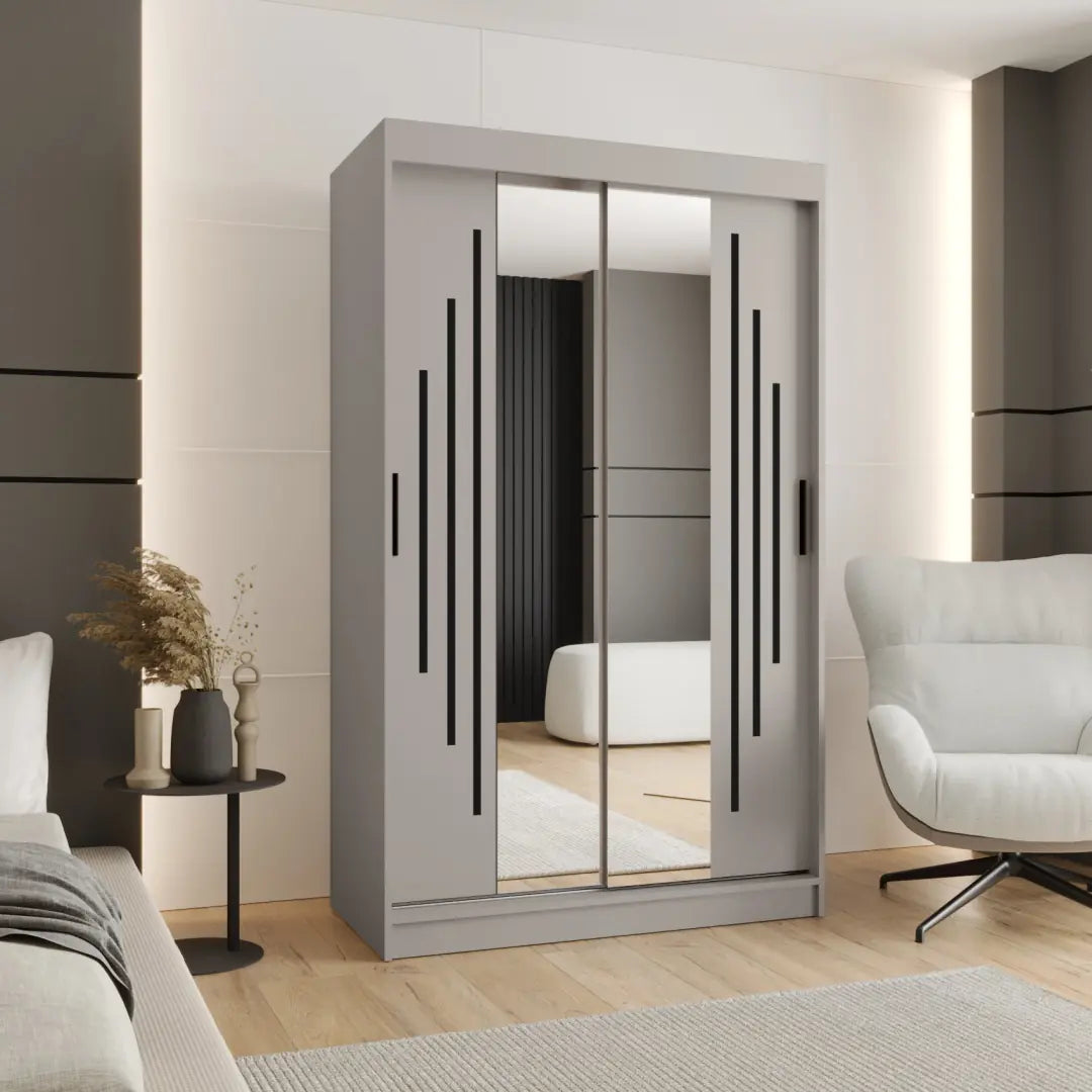 Sliding door wardrobe in a light grey finish with mirrored doors in a bedroom setting