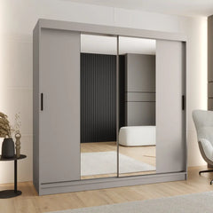 The sliding door wardrobe in a light grey finish with two central mirrored panels