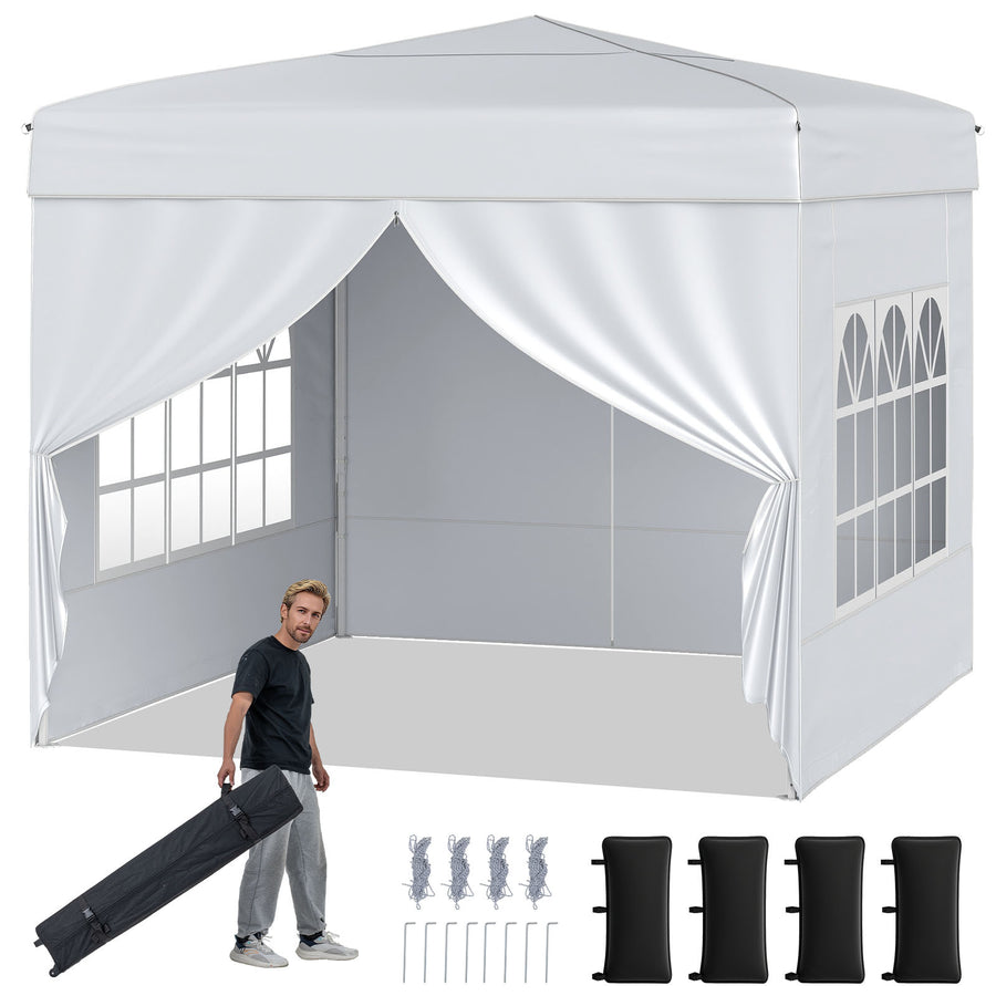 Pop up Canopy Tent with four sidewalls and a man holding a carry bag, with stakes and sandbags