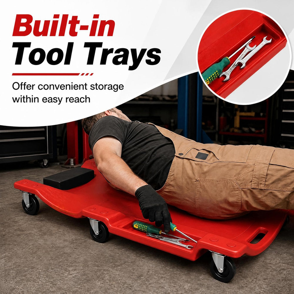 The garage creeper showing the side storage trays holding tools for easy access