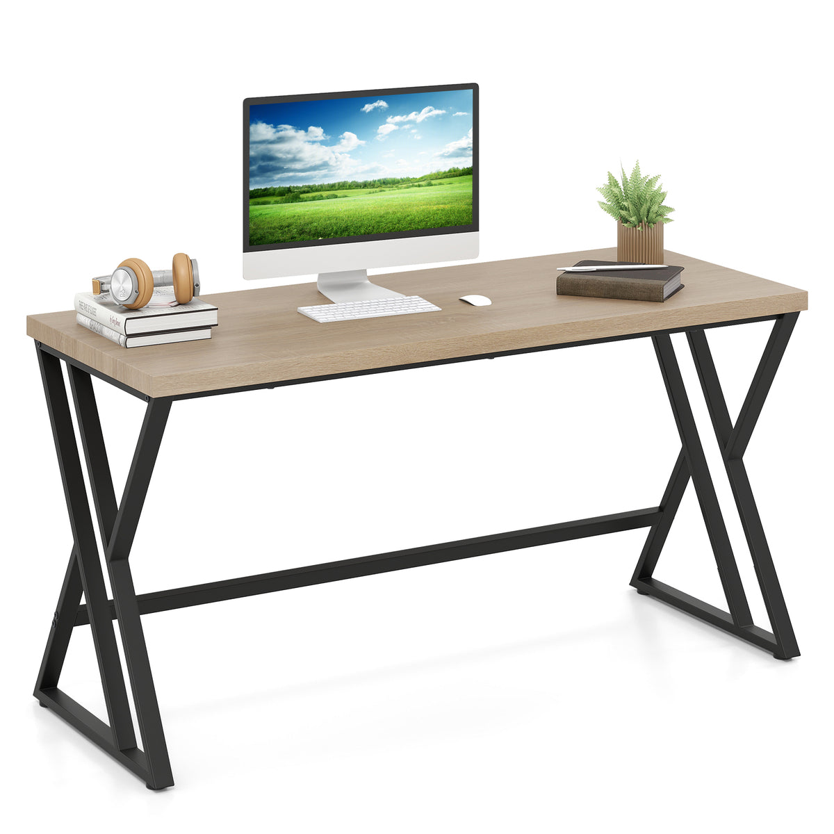 A grey computer desk with a computer and headphones on the tabletop