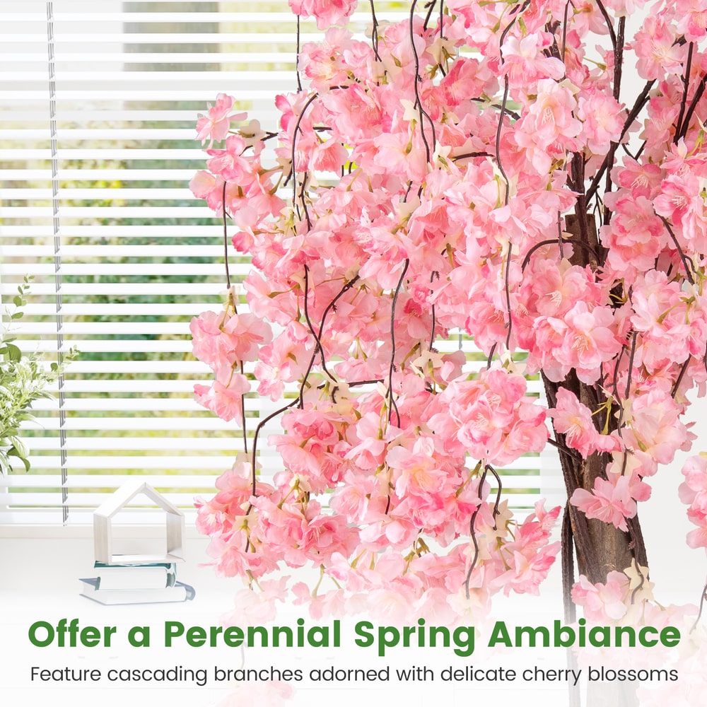The faux plants showing a close up of the pink flowers and cascading branches