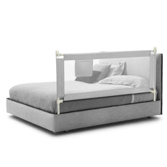 The grey bed guardrail fitted to a bed with grey bedding
