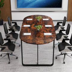 The conference table arranged with chairs and notebooks in a professional meeting room