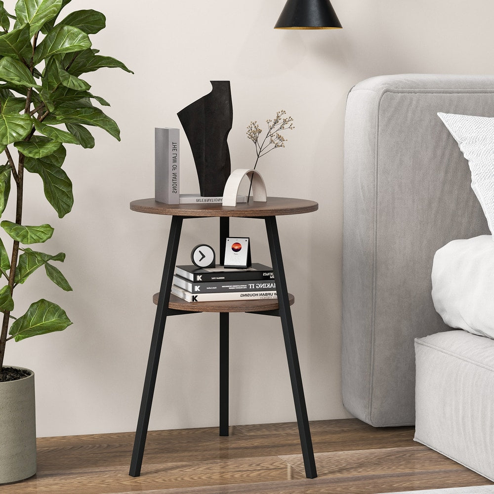 The side table placed next to a bed with books and decor on the shelves