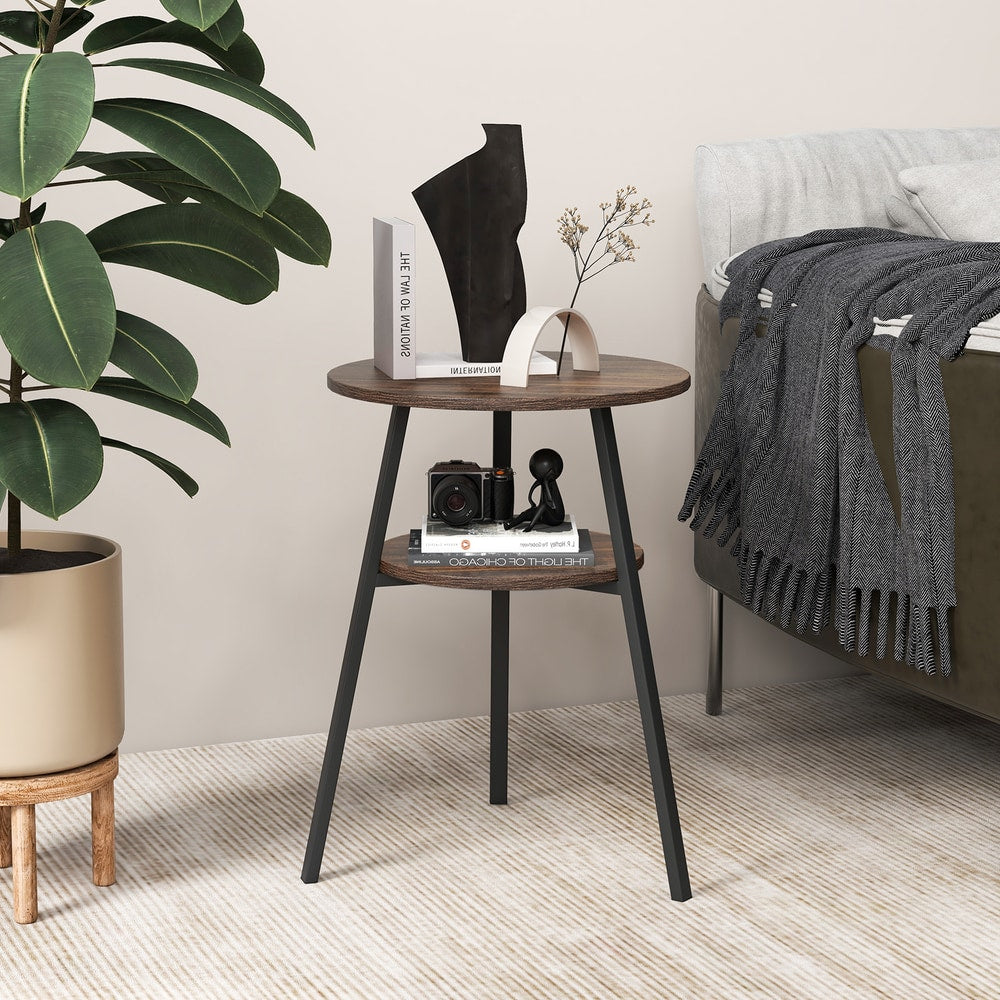 The round side table positioned beside a sofa with a plant nearby