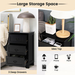 Black vintage nightstand with three deep drawers and space for lamp, phone, book and plant