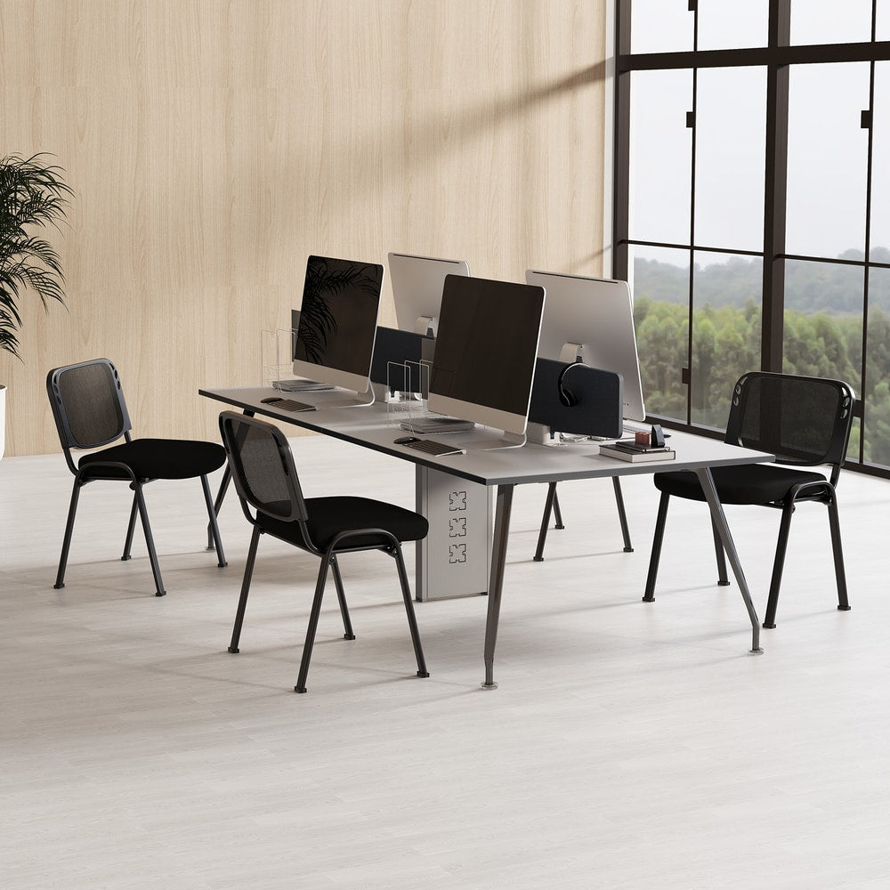 Black reception chairs at desks with computers