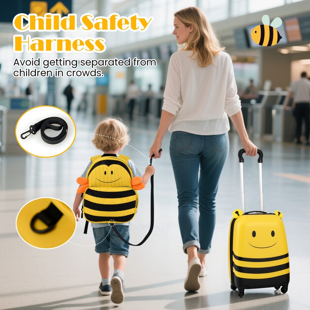 The kids luggage with a safety harness attached to the backpack in an airport