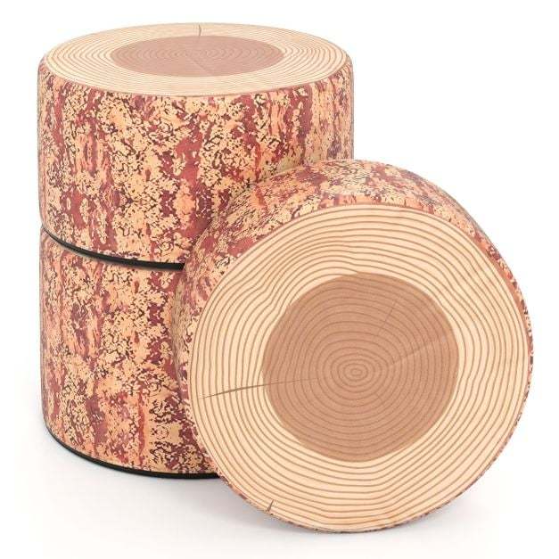 Three round tree stump stools stacked and one on its side, showing wood grain detail