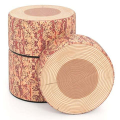 Three round tree stump stools stacked and one on its side, showing wood grain detail