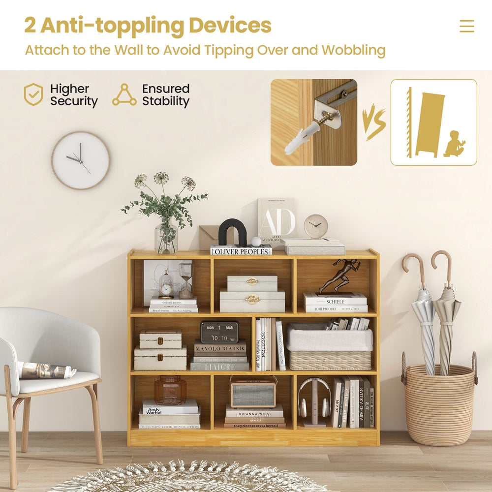 The wooden bookcase with anti-toppling devices shown attached to the wall