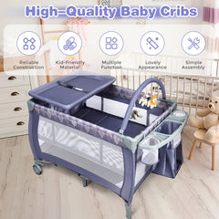 The baby playpen featuring a changing station and toy bar with various icons above it