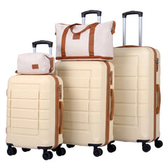 The kids luggage stacked together with the duffel and toiletry bag on top