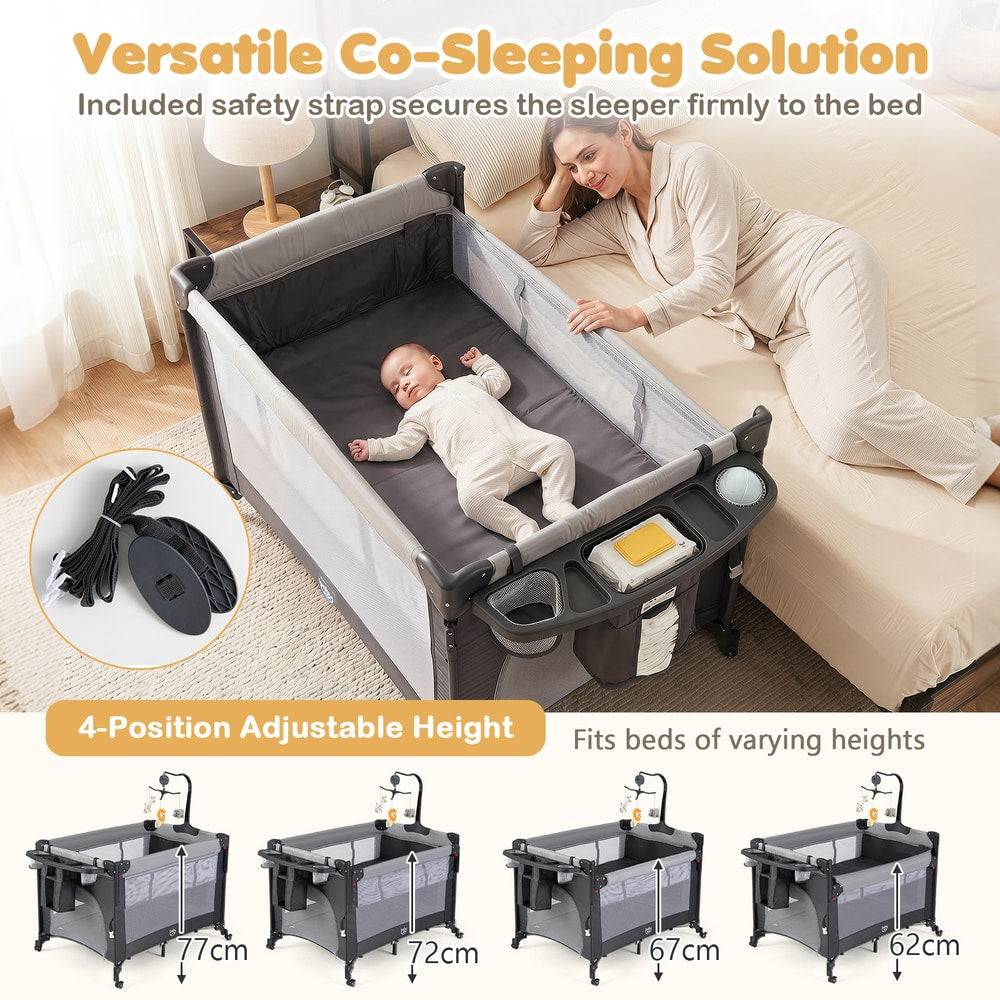 The bedside sleeper next to a bed with height adjustment options and a safety strap