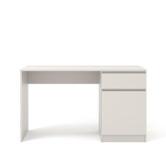 The desk viewed from a slightly elevated angle against a white backdrop