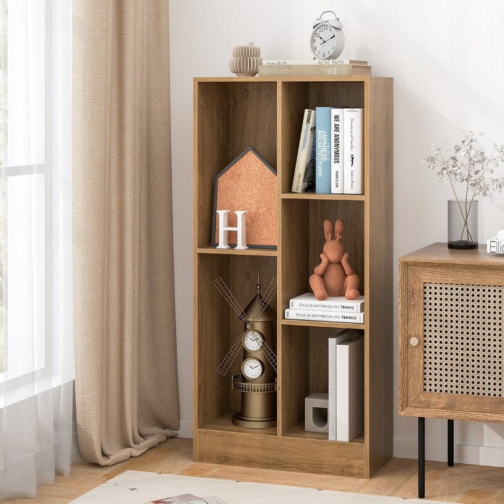 The natural wood effect bookcase filled with books and decorative items in a room setting