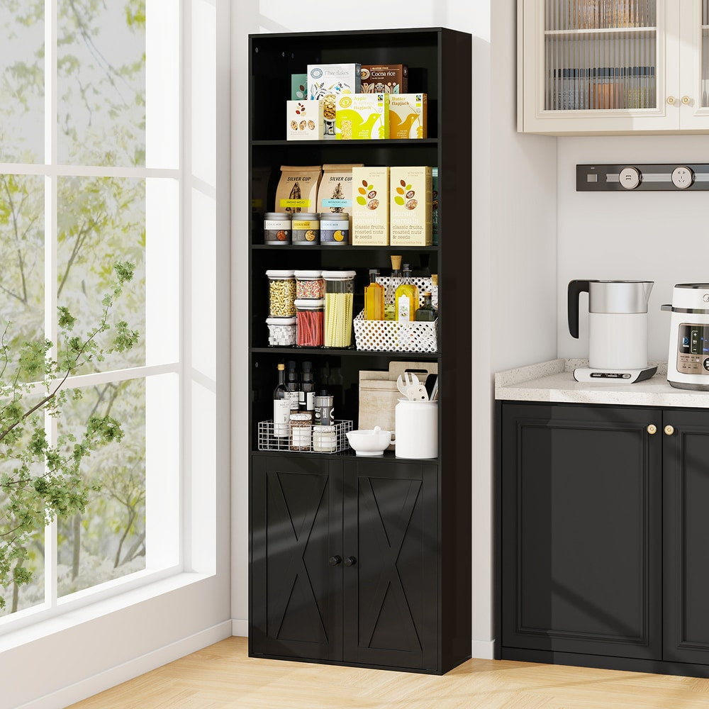 The black 6-tier bookcase with farmhouse style cabinet doors filled with kitchen items