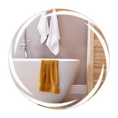 60 cm Round LED Bathroom Mirror reflecting a bathtub with a yellow towel