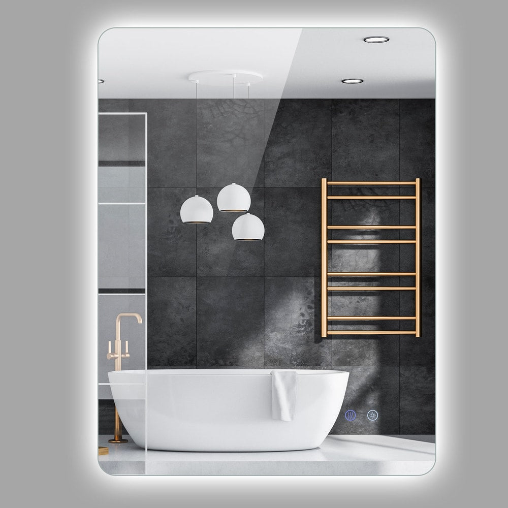 A rectangular wall mounted mirror with integrated lighting, shown in a bathroom setting with a bathtub and towel rack