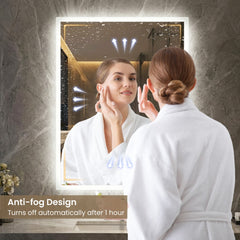 The bathroom mirror in use by a person with an illustration of the anti-fog function