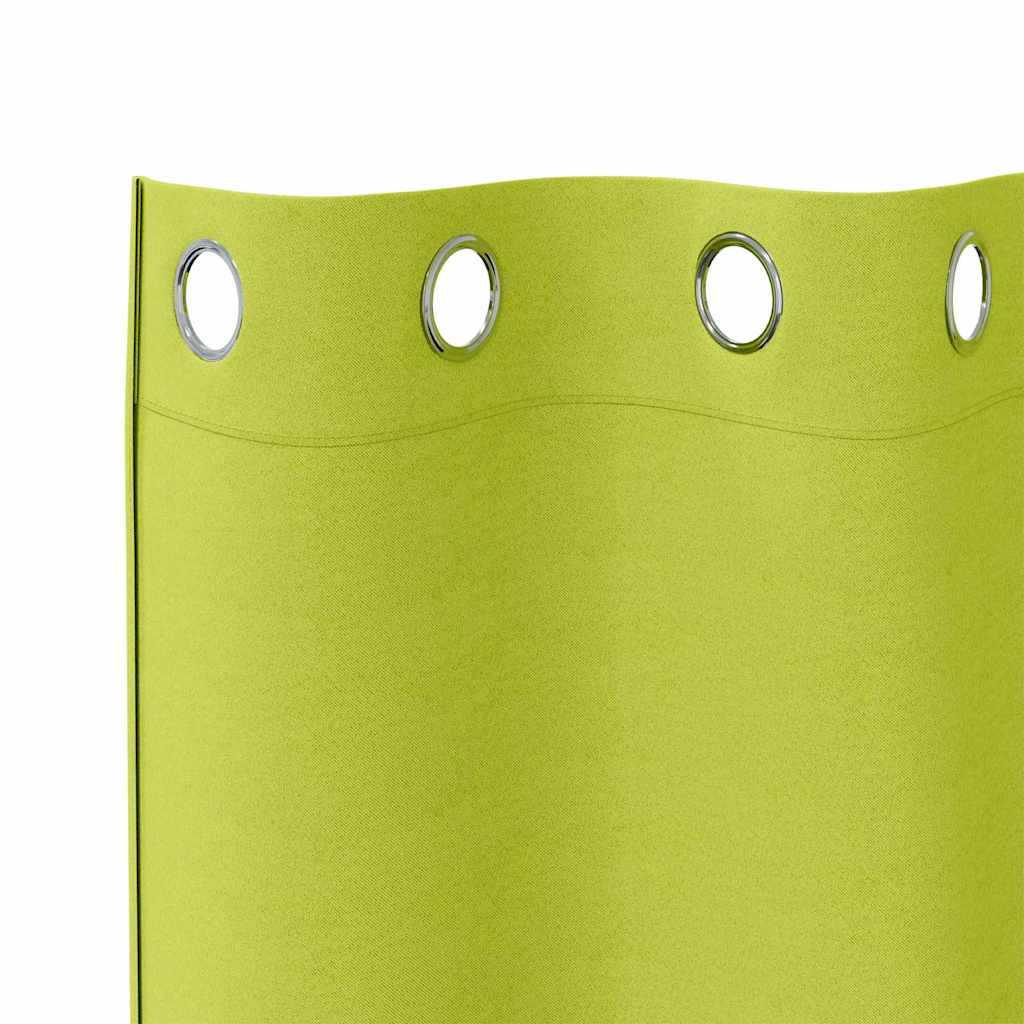 A close-up of the top section of the blackout curtains featuring silver metal rings