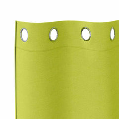 A close-up of the top section of the blackout curtains featuring silver metal rings