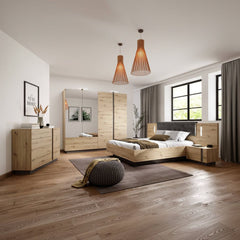 Modern bedroom with wooden furniture, including a bed, dresser, and wardrobe.