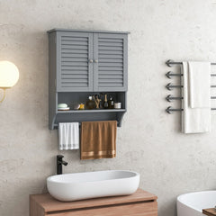 Grey bathroom wall cabinet with louvered doors, shown above a sink with towels