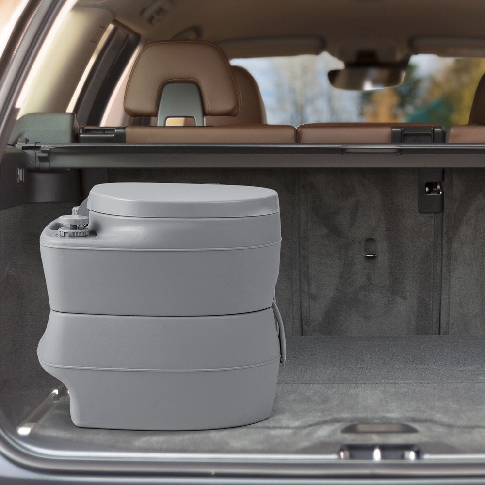 The portable toilet stored in the boot of a car