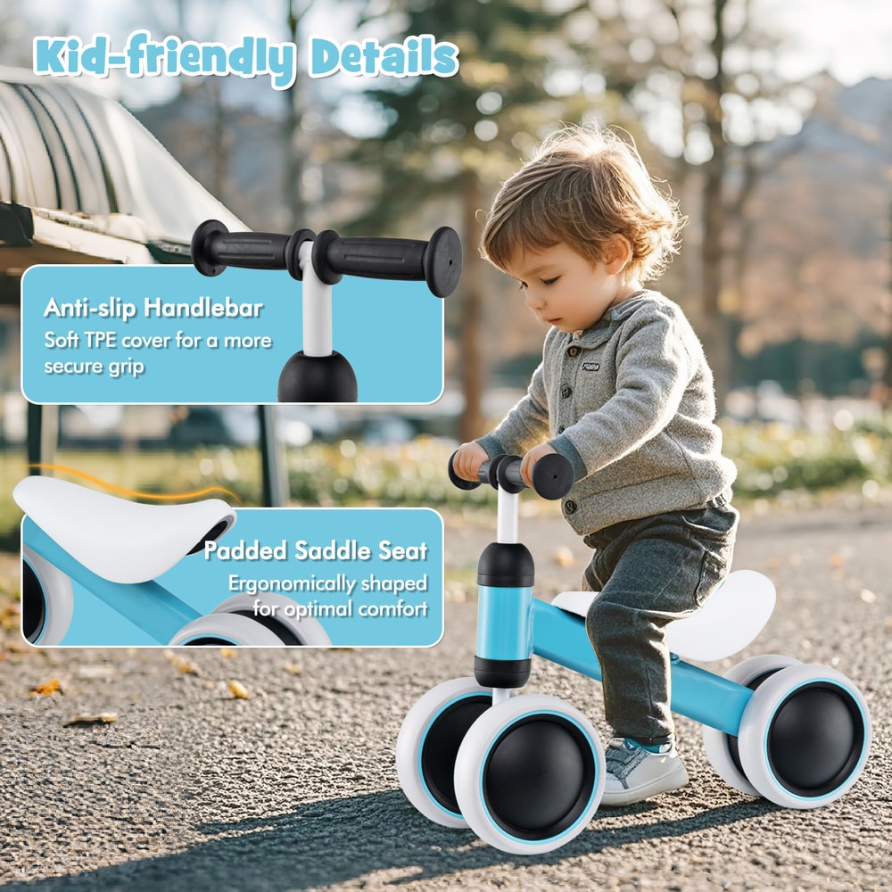 Close up of the blue balance bike showing the non-slip handlebar and padded seat