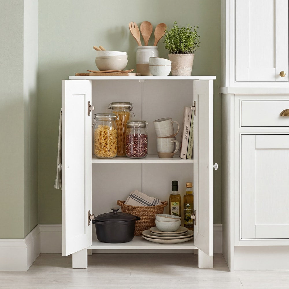 White kitchen cabinet with double doors open, filled with kitchenware and food items