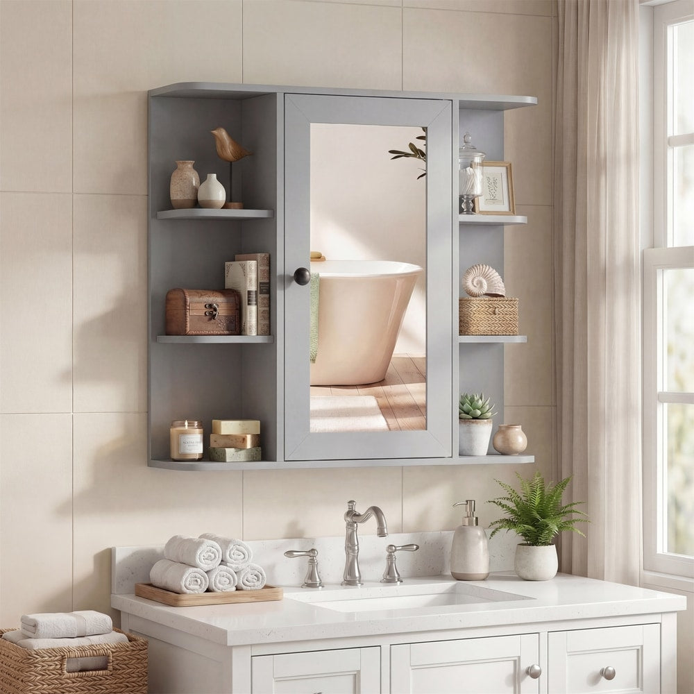 The wall cabinet mounted above a bathroom sink with decorative items on the side shelves