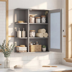 The wall cabinet with its mirrored door open to reveal the internal storage shelves