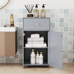 The cabinet with the door open revealing stacked towels and toiletries on the internal shelf