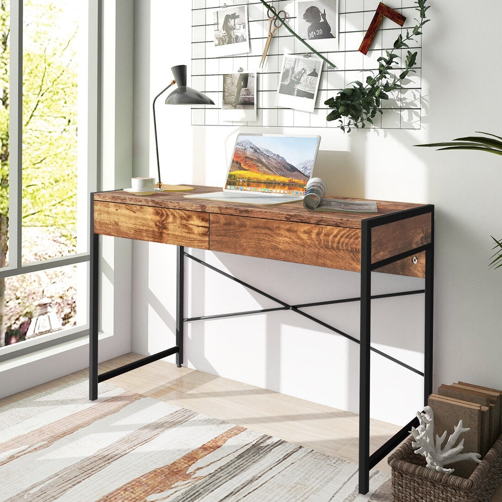 The rustic brown wooden desk with two drawers is set up in a bright room next to a window