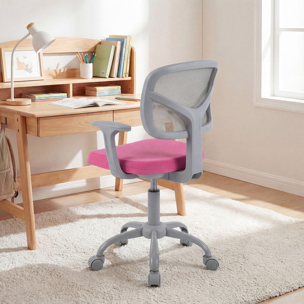 The kids desk chair is positioned next to a wooden desk in a child's bedroom