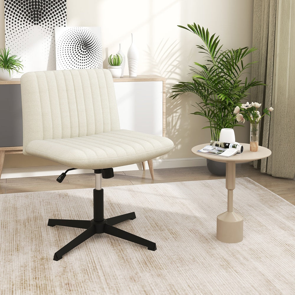 Beige office chair in a modern room with a small side table and a plant