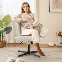 Woman sitting on the beige office chair holding a cushion