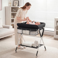 Woman changing a baby on the changing table in a nursery room