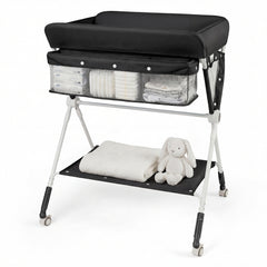 Black changing table with baby supplies and a stuffed bunny