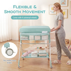 The changing table being pushed by a woman with a close up of the locking wheel