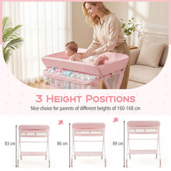 Pink changing table shown at three different height positions