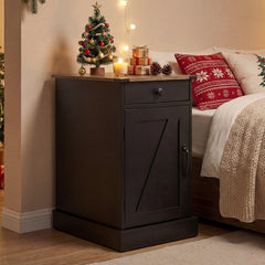 The black bedside table in a festive bedroom setting with Christmas decorations