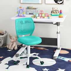 The kids chair placed in a child bedroom next to a white study desk on a dark blue space themed rug